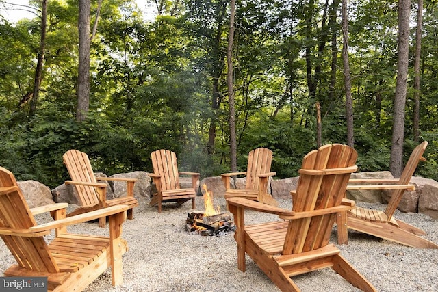 exterior space with an outdoor fire pit