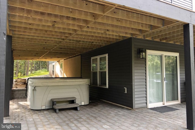 view of patio featuring a hot tub