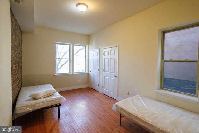 sitting room with light wood-style floors and baseboards