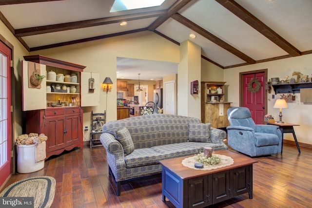 living area with lofted ceiling with beams and dark wood-type flooring