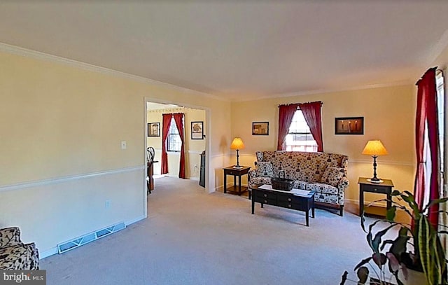 living room featuring crown molding, carpet, visible vents, and baseboards