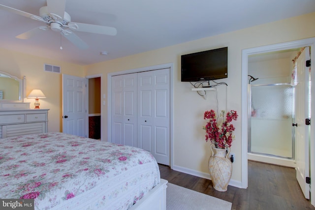 bedroom featuring baseboards, visible vents, a ceiling fan, dark wood-type flooring, and a closet