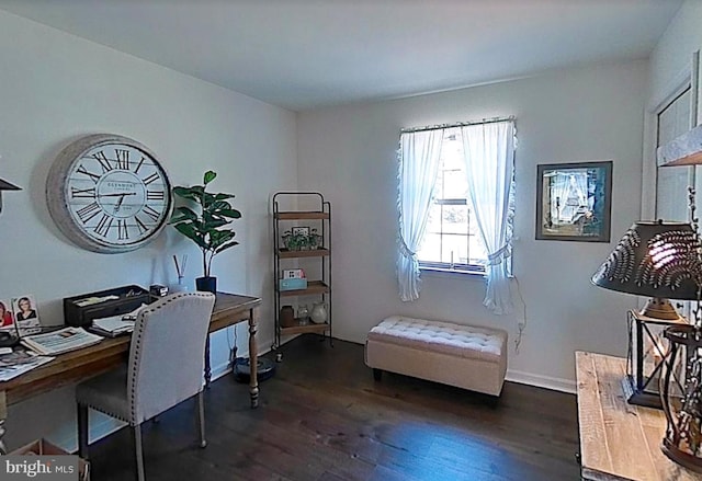 office area featuring dark wood-style flooring and baseboards