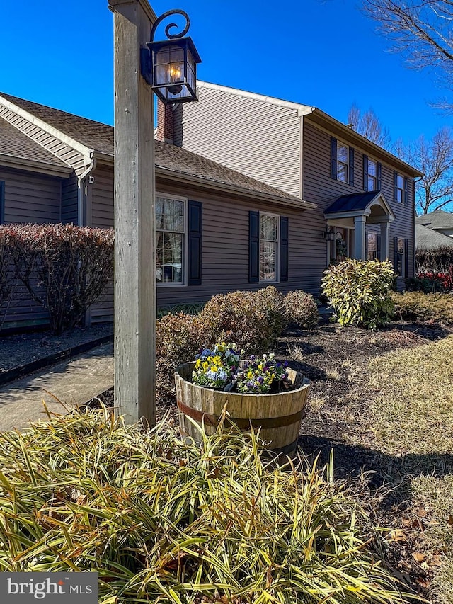 view of home's exterior with a chimney