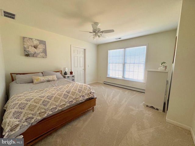 bedroom featuring visible vents, a baseboard heating unit, light carpet, ceiling fan, and baseboards