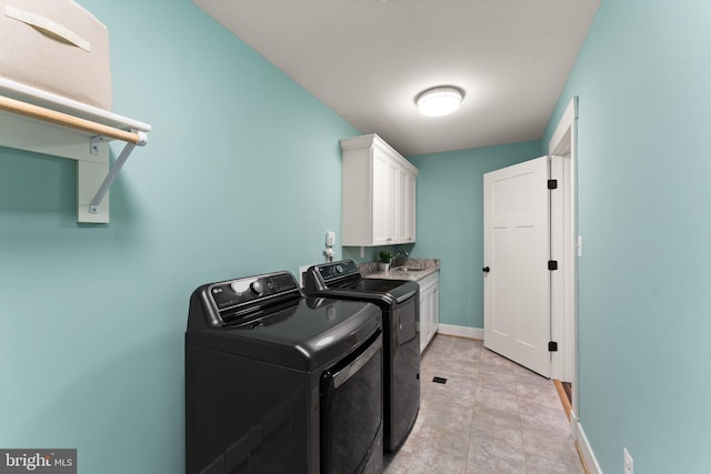 36976 Walnut Park Ln, Purcellville, VA 20132 - washroom featuring cabinet space, independent washer and dryer, and baseboards