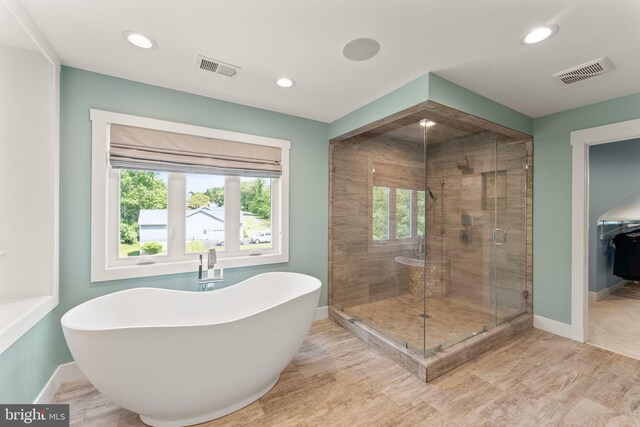36976 Walnut Park Ln, Purcellville, VA 20132 - full bathroom featuring a soaking tub, baseboards, a stall shower, plenty of natural light, and recessed lighting