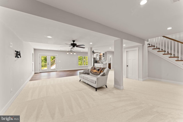 36976 Walnut Park Ln, Purcellville, VA 20132 - living room featuring carpet flooring, recessed lighting, french doors, stairs, and baseboards