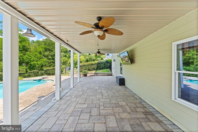 36976 Walnut Park Ln, Purcellville, VA 20132 - view of patio with ceiling fan and an outdoor pool