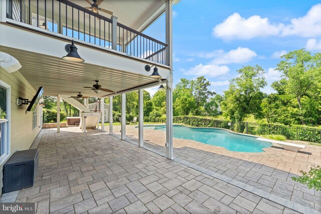 36976 Walnut Park Ln, Purcellville, VA 20132 - view of swimming pool featuring a ceiling fan, a patio, and view of scattered trees