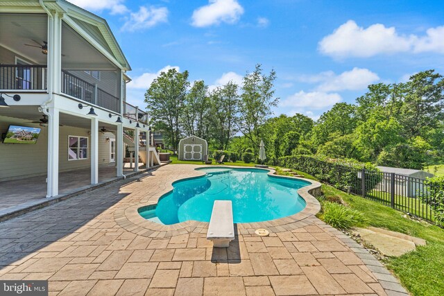 36976 Walnut Park Ln, Purcellville, VA 20132 - view of swimming pool with a ceiling fan, a patio area, a diving board, and stairs