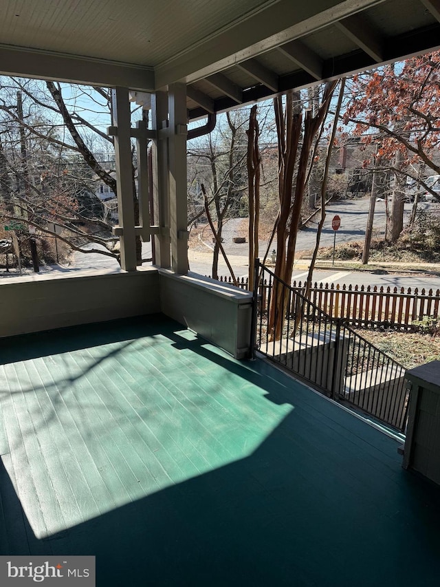 unfurnished sunroom featuring plenty of natural light