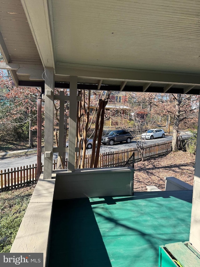 view of patio / terrace featuring fence