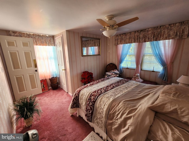 bedroom with ceiling fan and carpet flooring