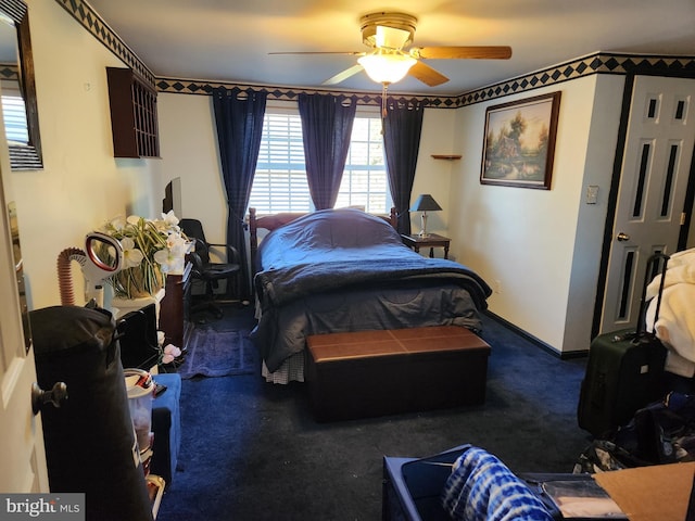 bedroom with baseboards, a ceiling fan, and carpet flooring