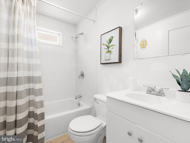 bathroom featuring toilet, tile patterned flooring, shower / tub combo with curtain, and vanity