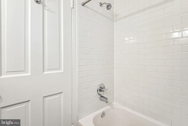 bathroom with shower / bath combination