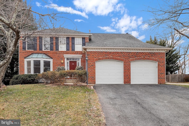 view of front facade featuring an attached garage, driveway, brick siding, and a shingled roof