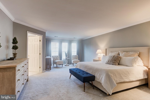 bedroom with crown molding and light colored carpet