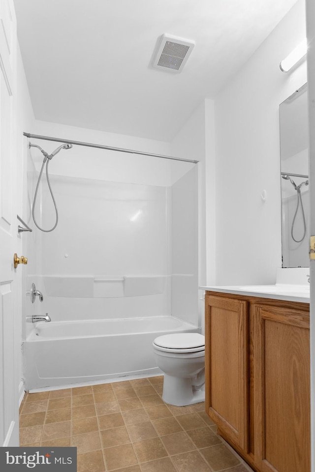 bathroom featuring toilet, shower / tub combination, visible vents, and vanity