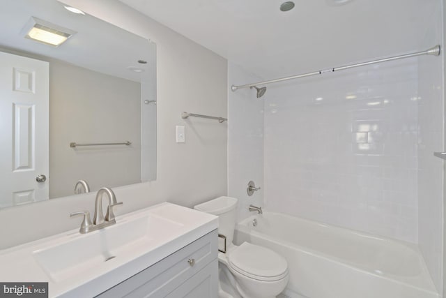 full bath featuring vanity, toilet, and  shower combination