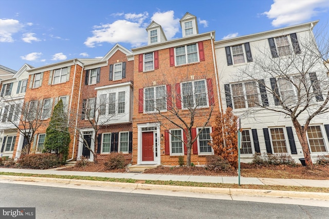 multi unit property featuring brick siding