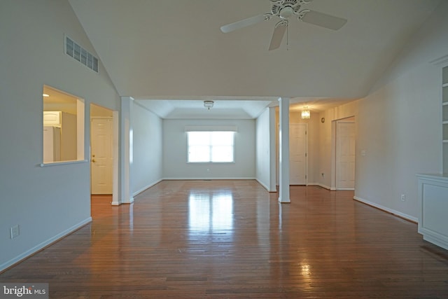 unfurnished room with visible vents, ceiling fan, wood finished floors, high vaulted ceiling, and baseboards