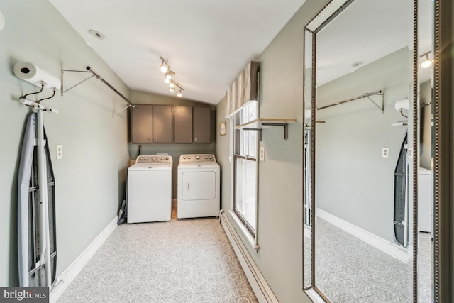 laundry room with independent washer and dryer, cabinet space, and baseboards