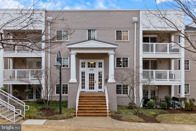 view of front of house with brick siding