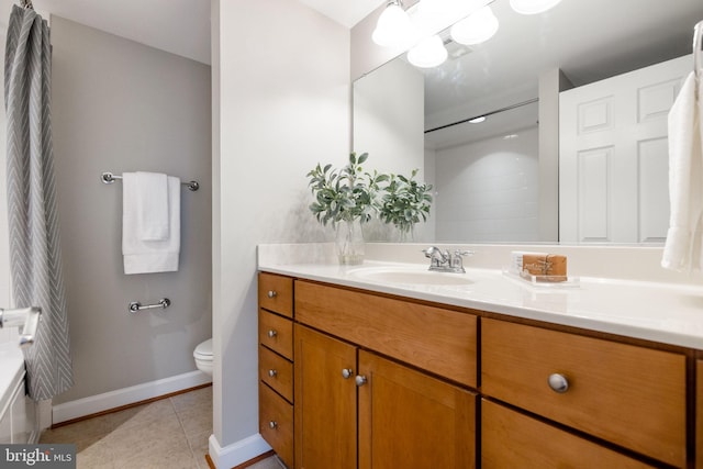 full bath featuring visible vents, baseboards, toilet, tile patterned floors, and vanity