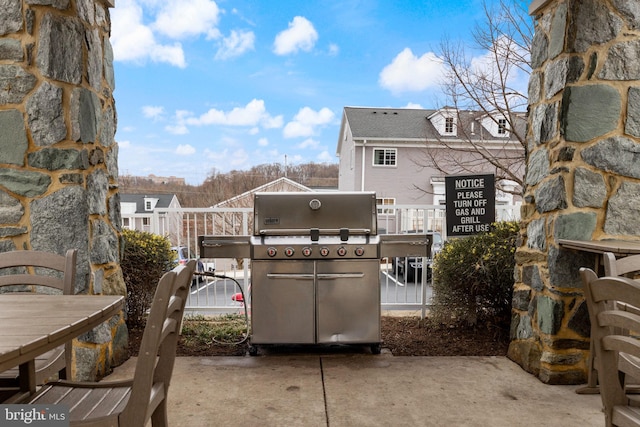 view of patio with a grill