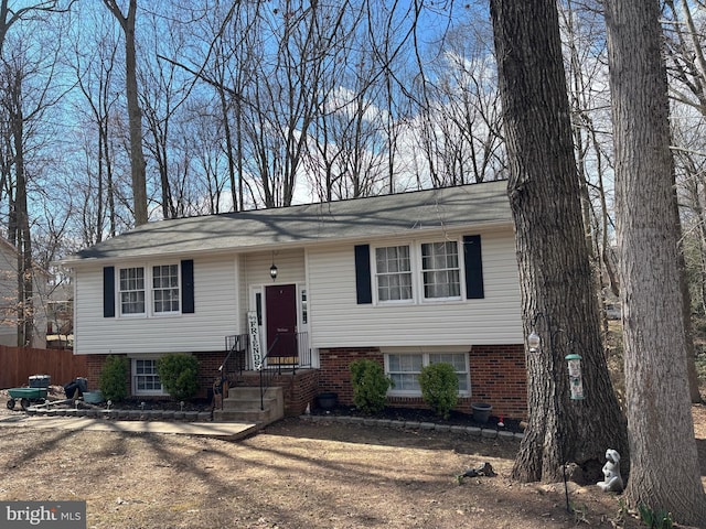 bi-level home with fence