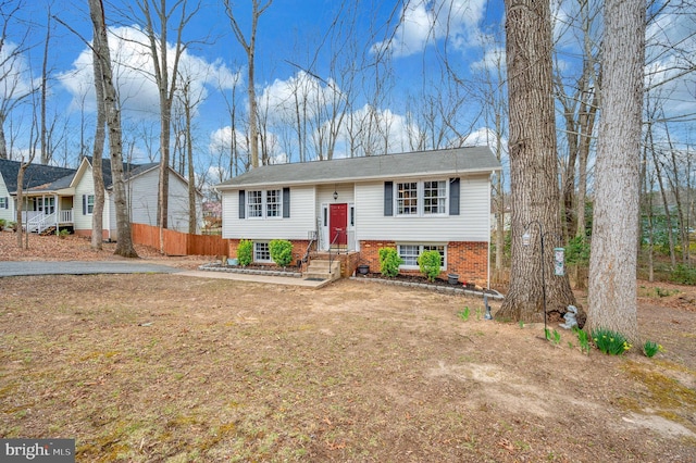 bi-level home with fence