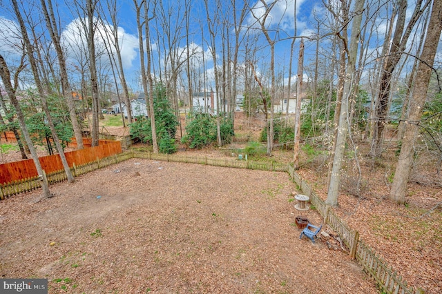view of yard with fence