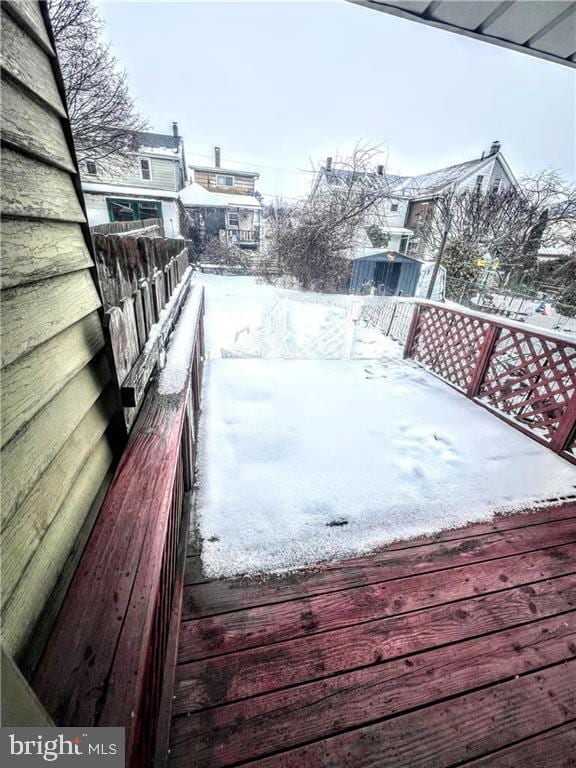 view of snow covered deck