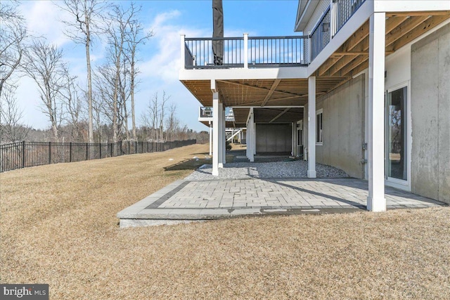 exterior space featuring a patio area and fence