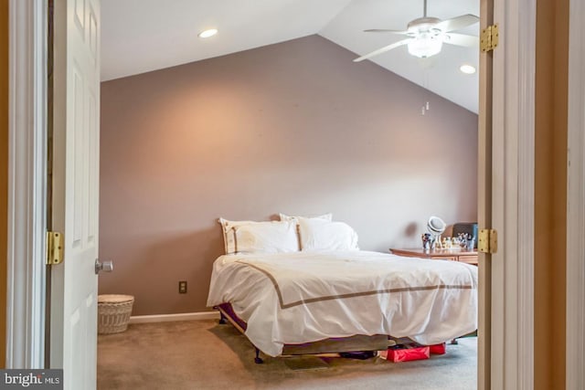 bedroom with lofted ceiling, carpet flooring, ceiling fan, and baseboards