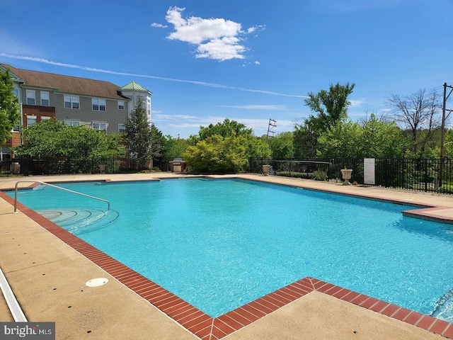 pool featuring fence