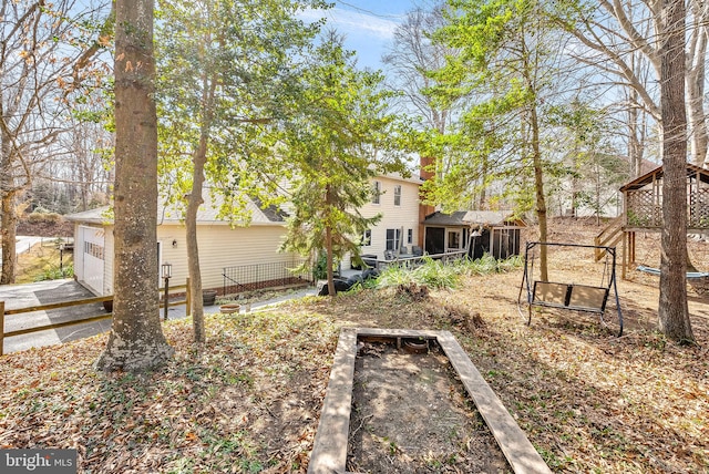 view of yard featuring an attached garage