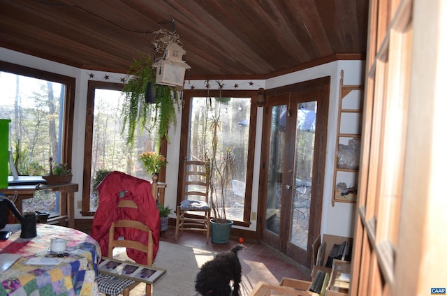 sunroom featuring wood ceiling