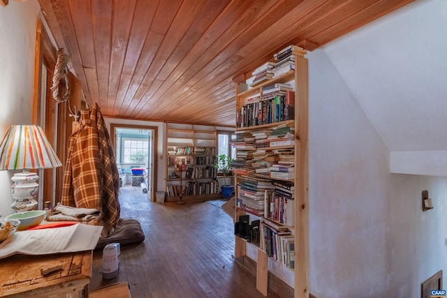 hall with wooden ceiling and hardwood / wood-style flooring