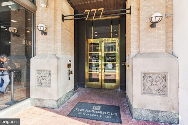 view of exterior entry featuring french doors