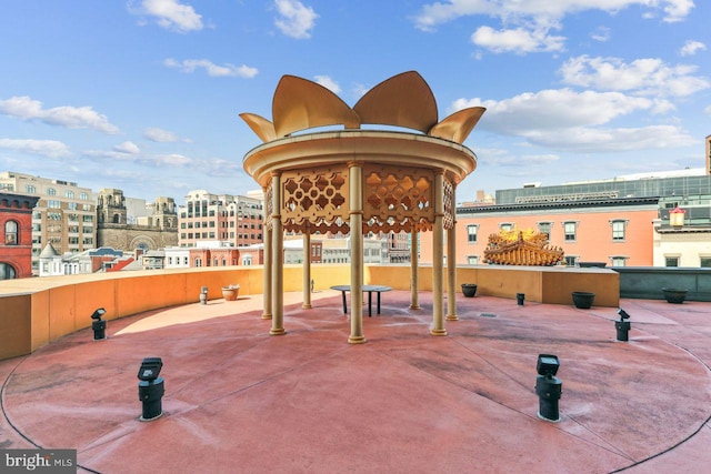 view of home's community with a view of city and a patio area