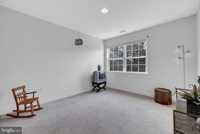 sitting room with carpet floors, recessed lighting, visible vents, and baseboards