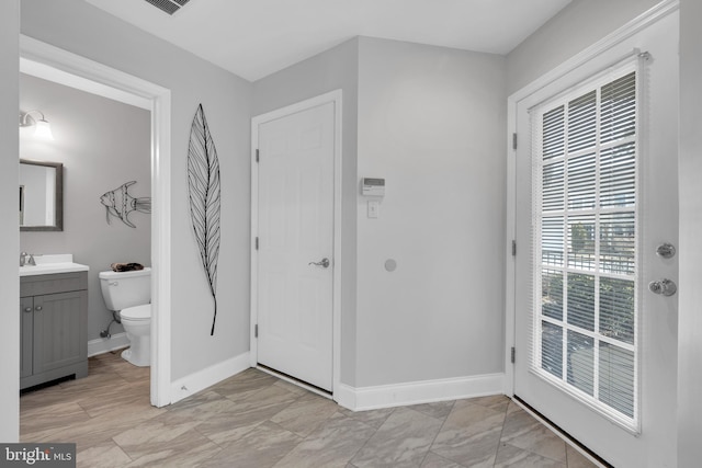 interior space with baseboards