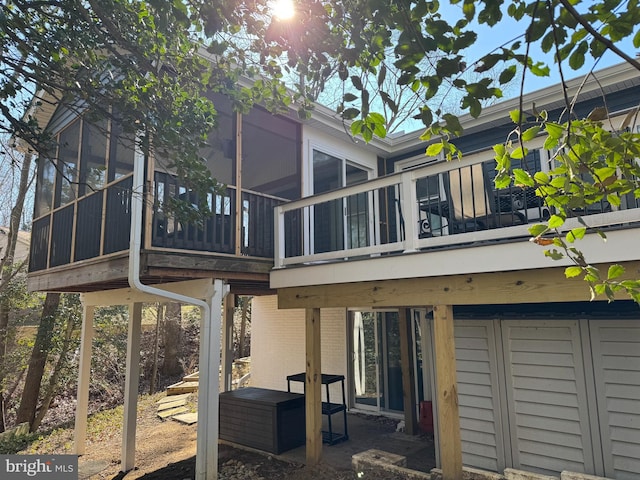 back of property with brick siding