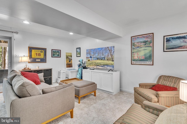 living area with light carpet, baseboards, and recessed lighting