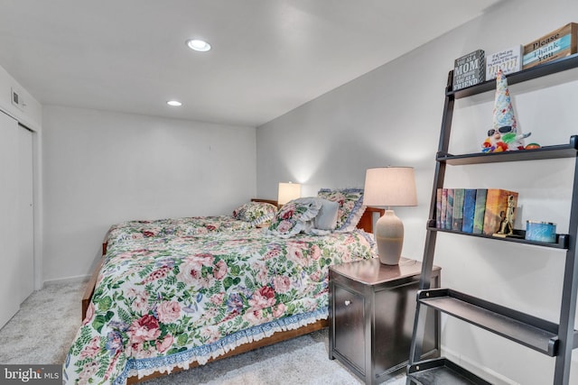 bedroom featuring light carpet, visible vents, and recessed lighting