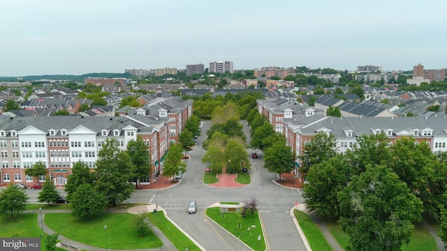 birds eye view of property with a view of city