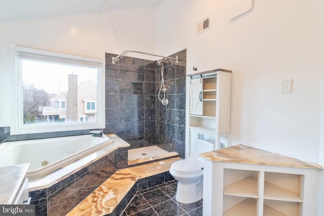 full bathroom with visible vents, toilet, a jetted tub, vaulted ceiling, and a tile shower